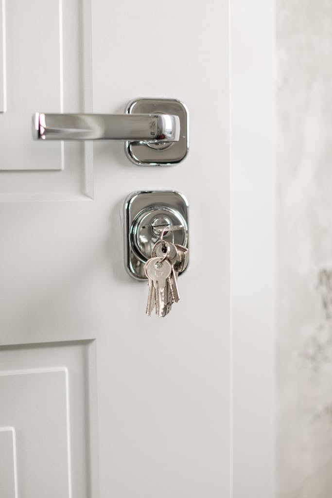 Keys inserted in the Lock of a Door